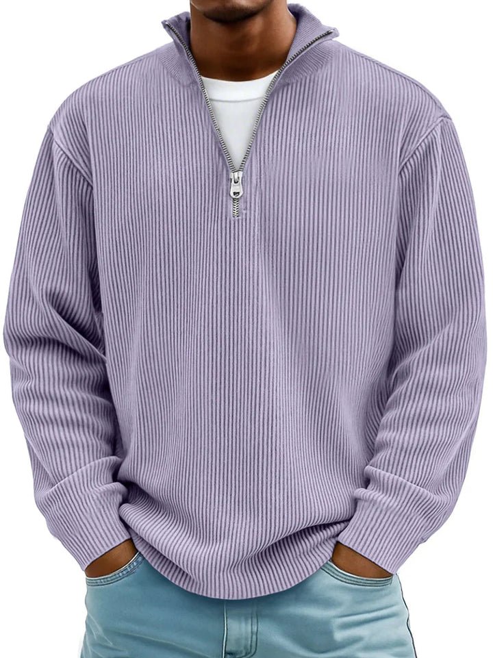 Lavender men's ribbed half-zip sweater with a stand collar and relaxed fit, worn over a white t-shirt.