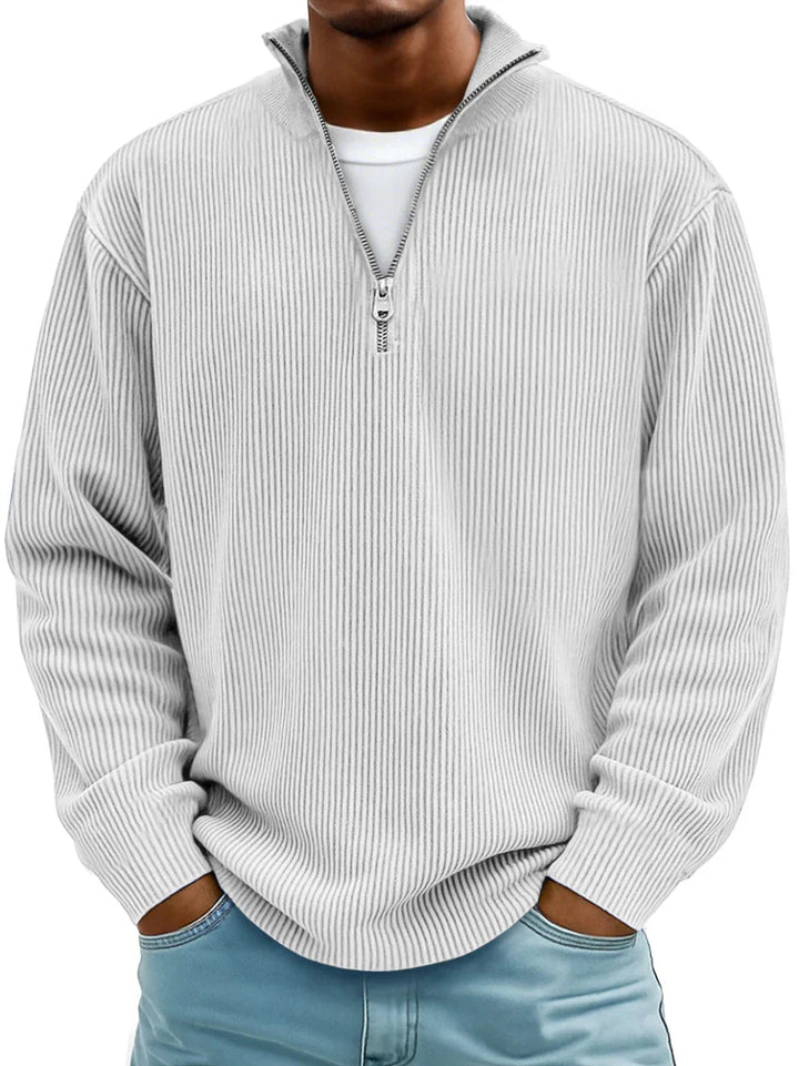 Light grey men's half-zip sweater in a vertical ribbed knit with a stand collar and relaxed fit.