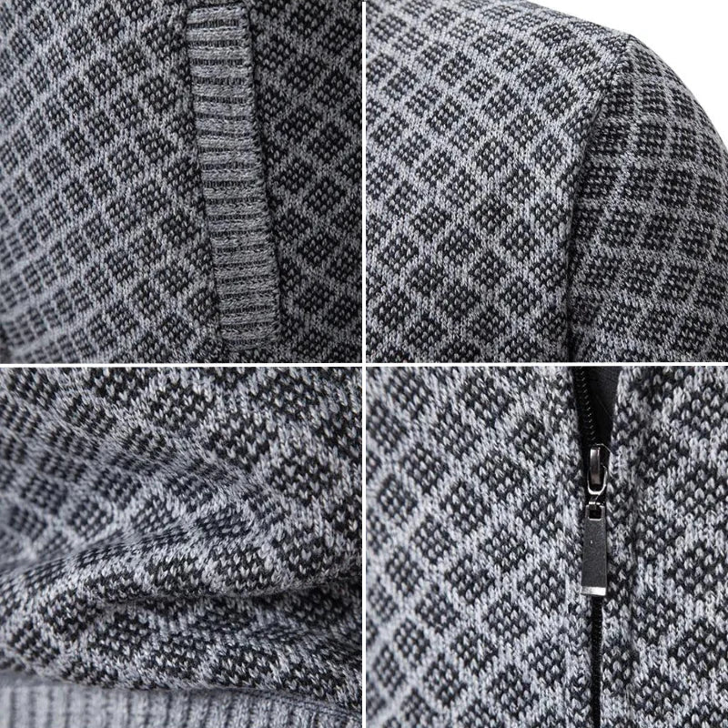 Close-up of a grey and black diamond-textured knit cardigan with a full-length metal zip and ribbed trim details.