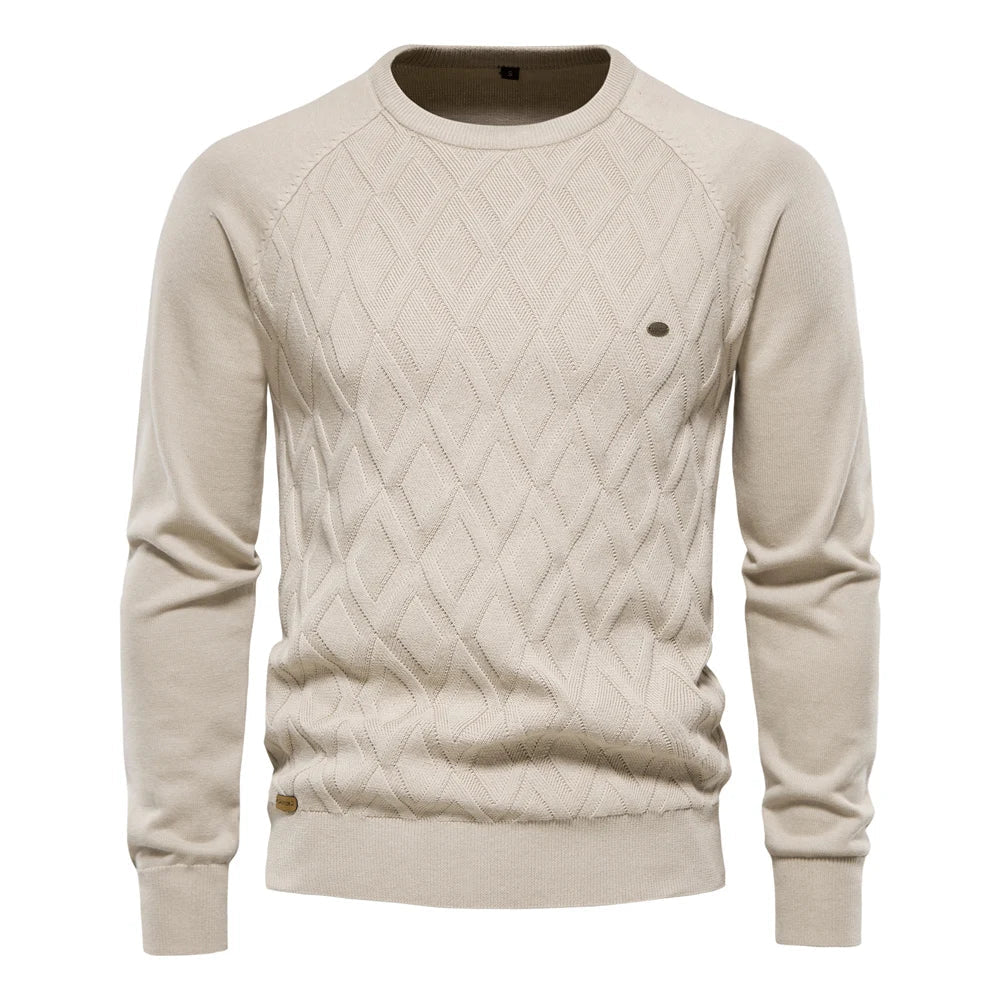 Beige men's crew neck jumper featuring a textured diamond-knit pattern, long sleeves, and ribbed cuffs and hem.