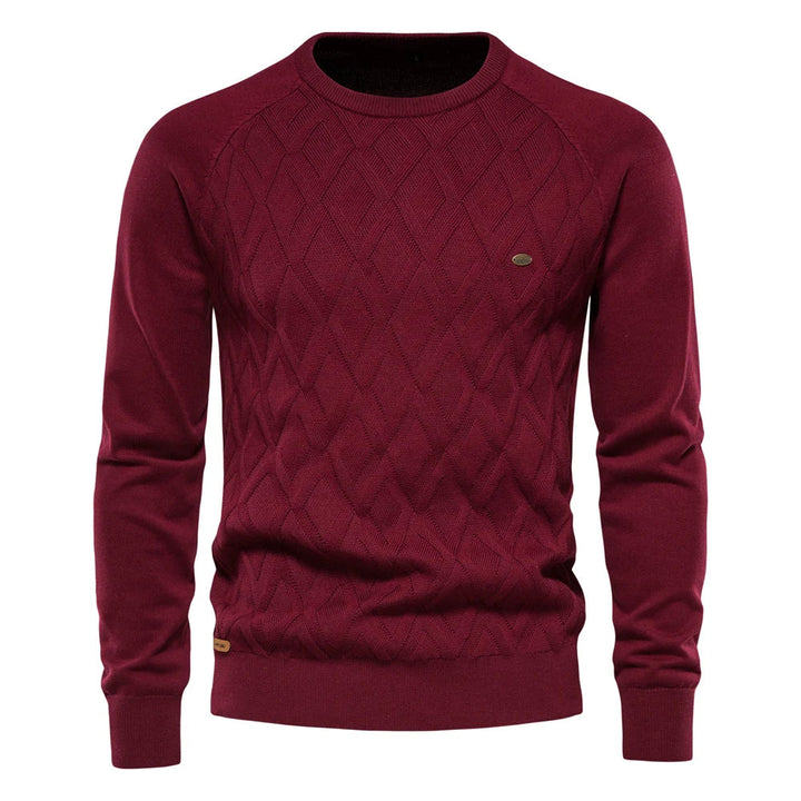 Burgundy men's crew neck jumper featuring a textured diamond-knit pattern, ribbed cuffs, and a classic fit.