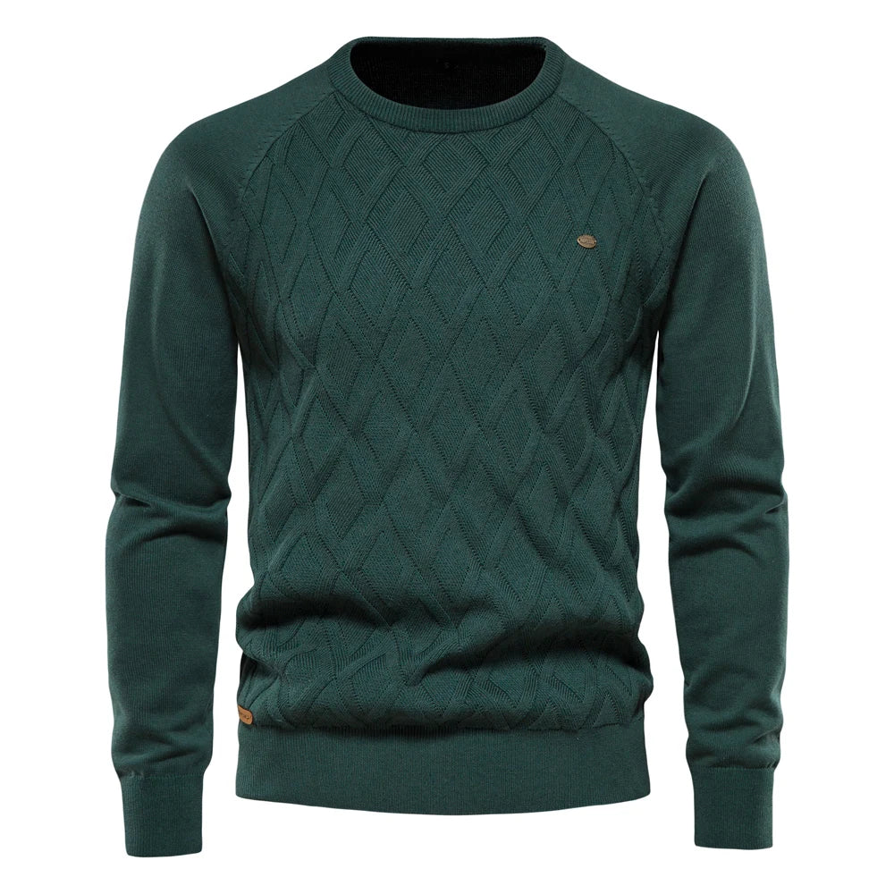 Dark green men's crew neck jumper featuring a textured diamond-knit pattern, ribbed cuffs, and a classic fit.