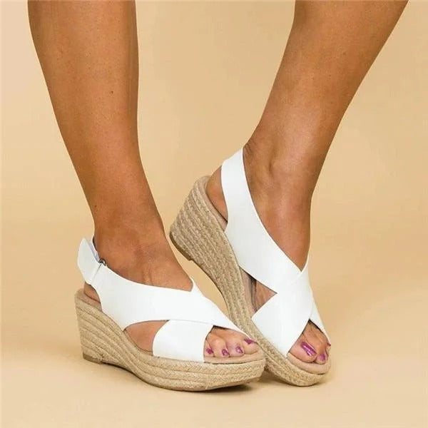 Eloise white leather orthopedic espadrille wedge sandals with adjustable cross straps and jute-wrapped 2.5" wedge.