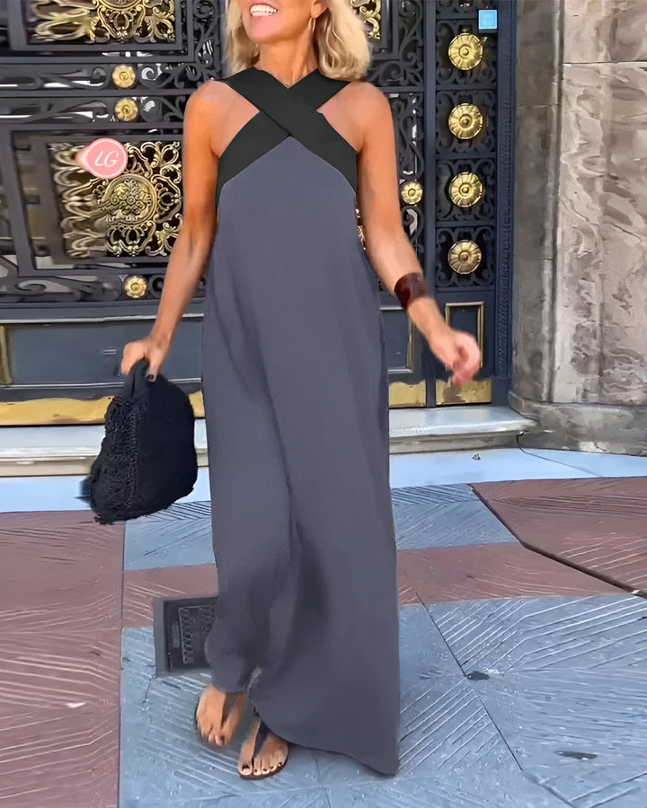 Elsie Women's Crossover Maxi Dress in charcoal grey, featuring a flattering black crossover neckline and flowing silhouette.