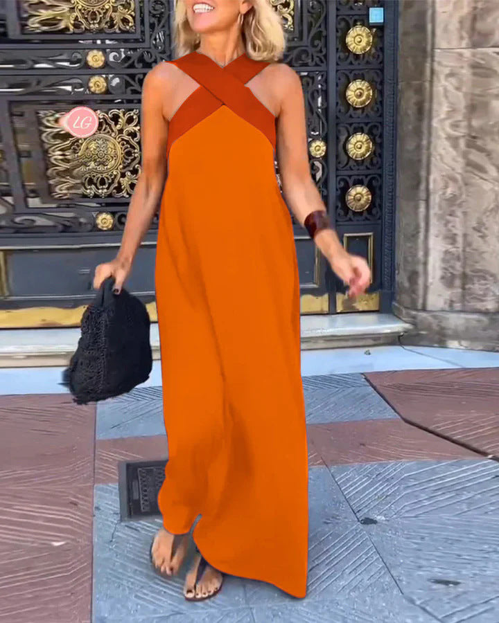 Elsie women's orange crossover maxi dress with a flowing silhouette, perfect for breezy elegance.