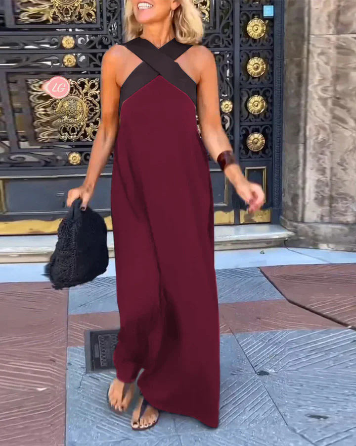 Women's Elsie crossover maxi dress in breezy burgundy, featuring a flattering black crisscross neckline and flowing silhouette.