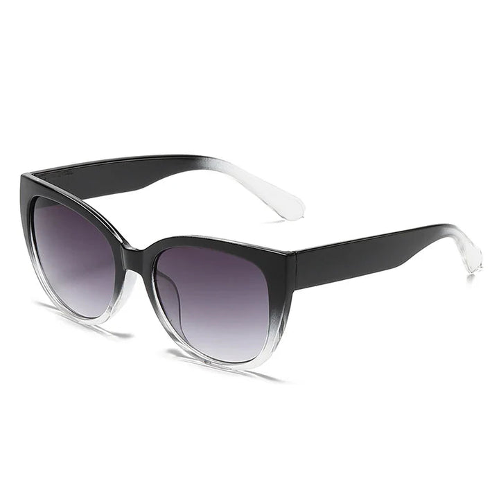 Faye women's butterfly gradient sunglasses with black-to-clear frames and wide temples.