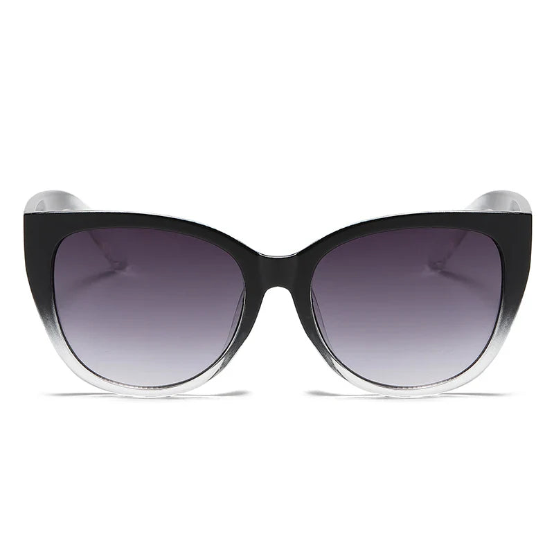 Faye women's butterfly gradient sunglasses with black-to-clear frames and refined gradient lenses.