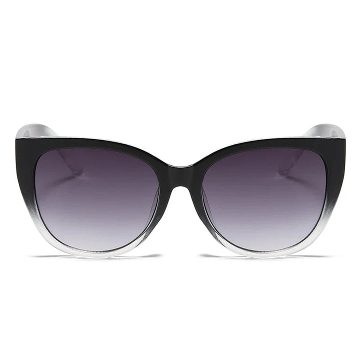 Faye women's butterfly gradient sunglasses with black-to-clear frames and refined gradient lenses.