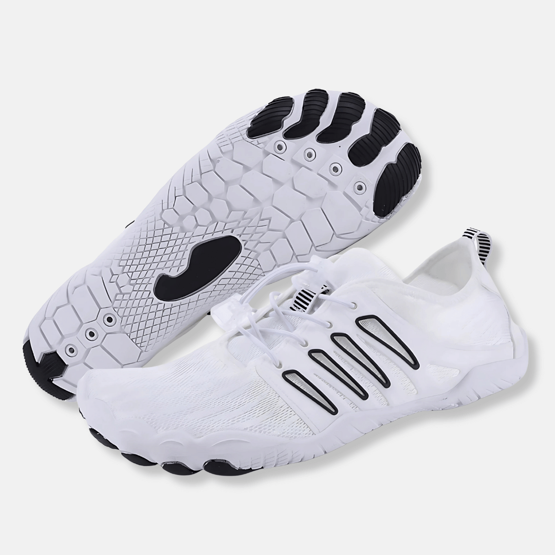 White lightweight barefoot walking shoes with ventilated mesh, bungee laces, and a flexible black and white treaded sole.