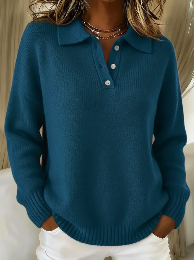 Teal blue relaxed-fit knit jumper featuring a collared polo neckline, button placket, and ribbed cuffs and hem.