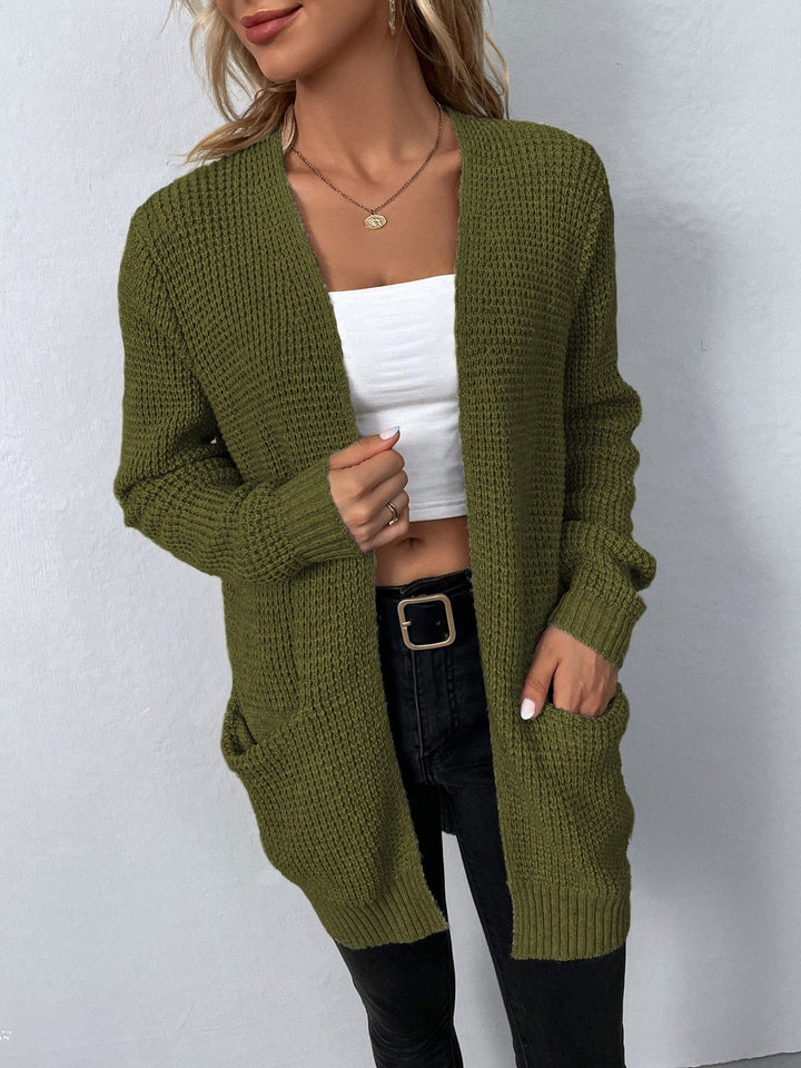 Olive green open-front waffle-knit cardigan with a relaxed fit, collarless design, and convenient side pockets.