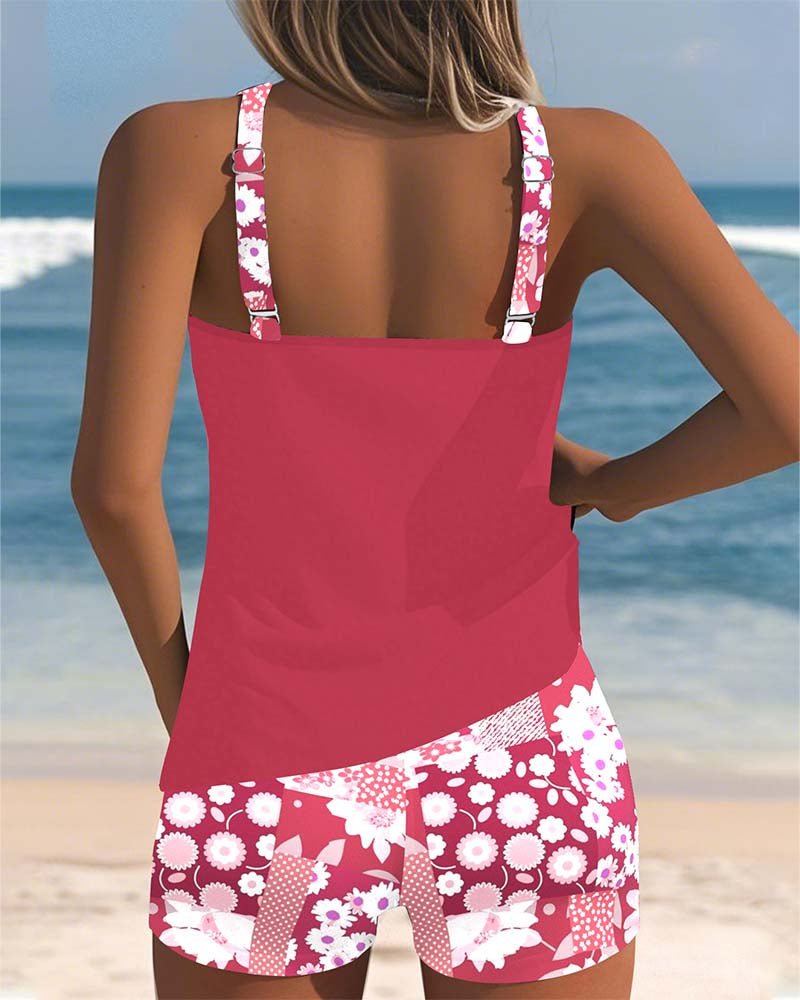 Women's Freya floral tankini with a red scoop-neck top and coordinating pink floral print shorts.