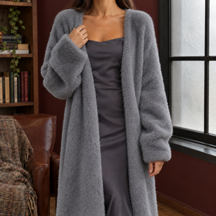 Grey longline plush knit cardigan with an open front and voluminous sleeves, styled over a matching dark grey dress.