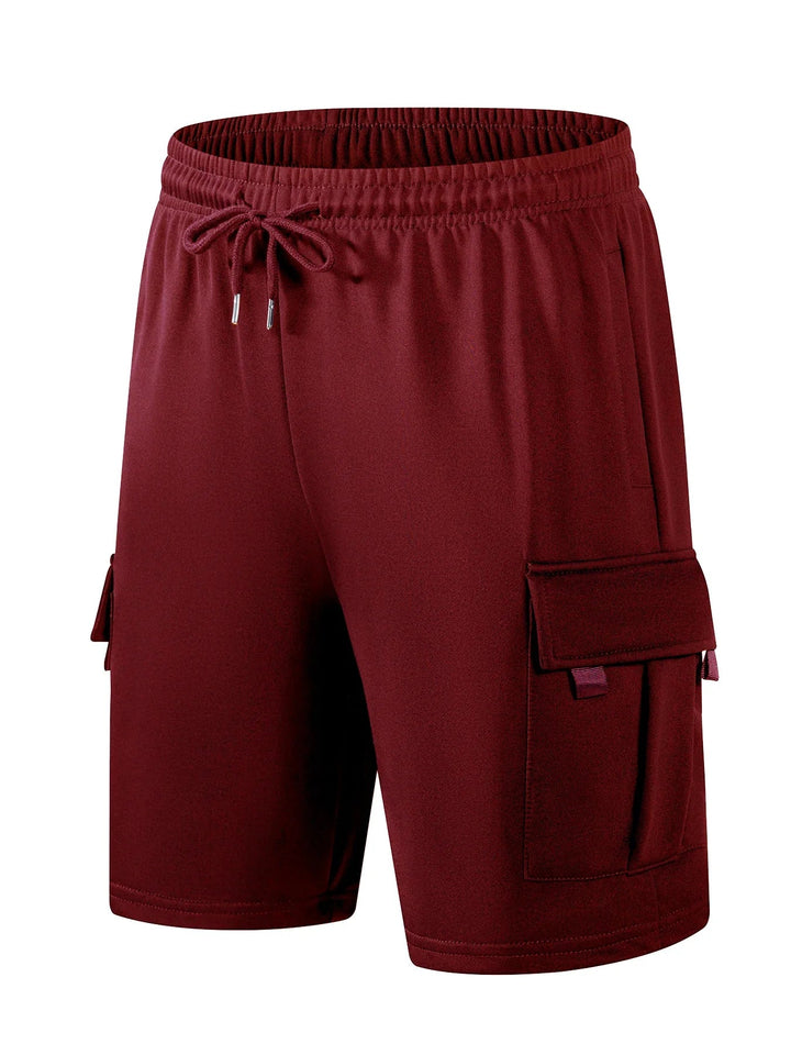 Men's maroon cargo shorts featuring an elasticated drawstring waist and side flap pockets for practical storage.