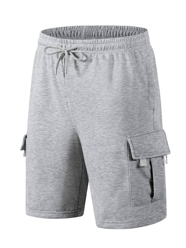 Grey jersey drawstring cargo shorts with elastic waist and side flap pockets.