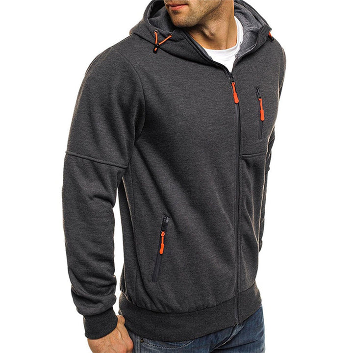 Charcoal grey men's zip-up hoodie featuring a drawstring hood and vibrant orange zipper pulls on the front and chest.