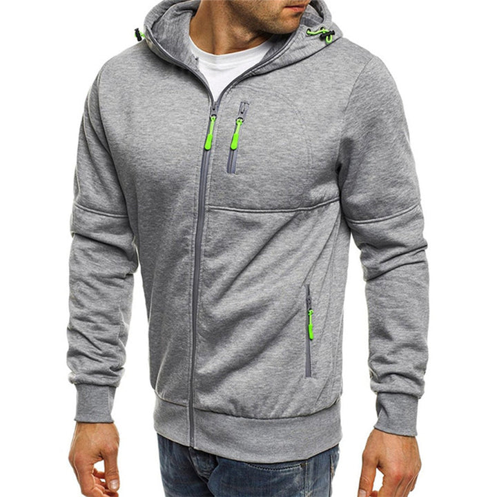 Grey zip-up hooded jacket with neon green accents, drawcord hood, and multiple zippered pockets.