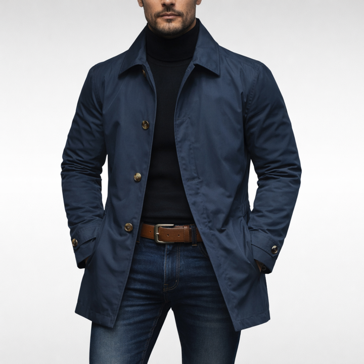 Men's navy windproof, water-resistant jacket with a point collar, button front, and adjustable cuffs for a polished look.