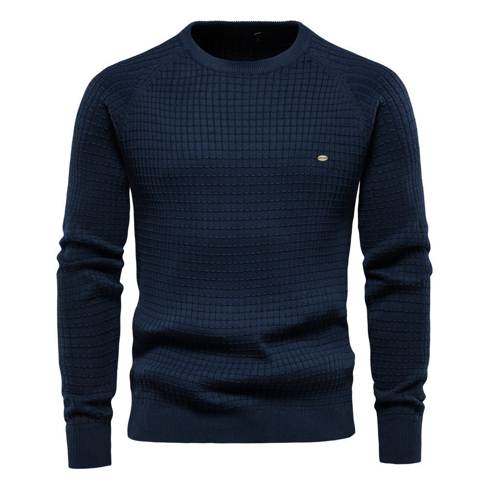Navy blue men's crew neck jumper with a textured waffle knit, raglan sleeves, and ribbed trims.