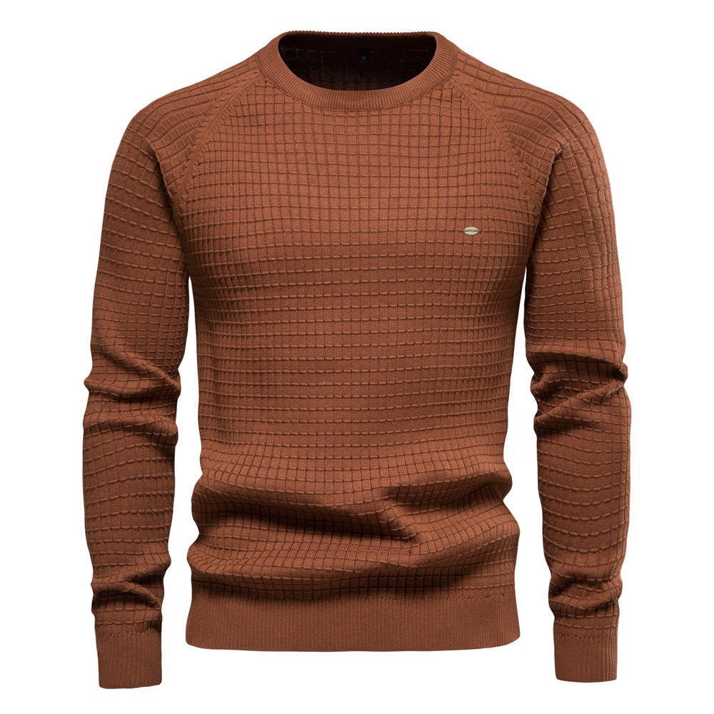 Brown men's crew neck jumper with a waffle-textured knit, raglan sleeves, and ribbed trim details.
