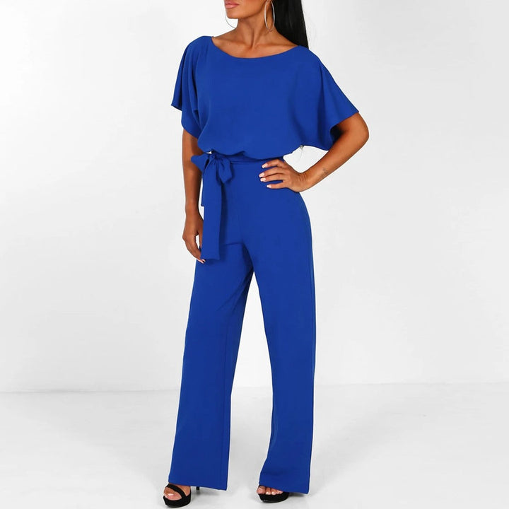 Grace women's royal blue tie-waist wide-leg jumpsuit with draped short sleeves.
