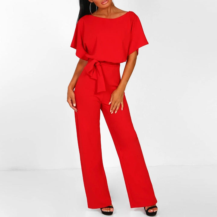 Grace women's red tie-waist wide-leg jumpsuit with draped short sleeves.