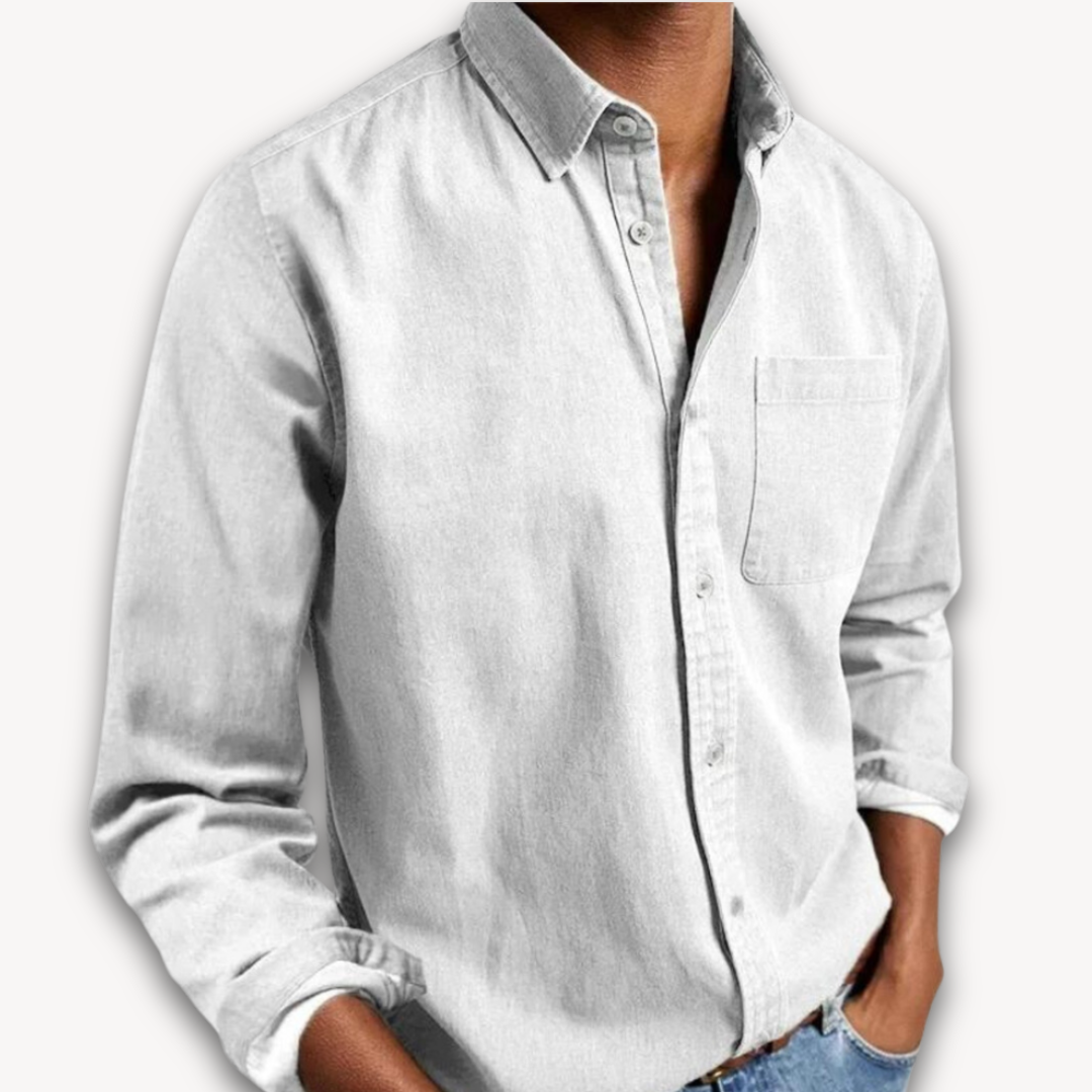 Light grey long-sleeve button-up shirt with a classic collar and chest pocket, styled for a smart-casual look.