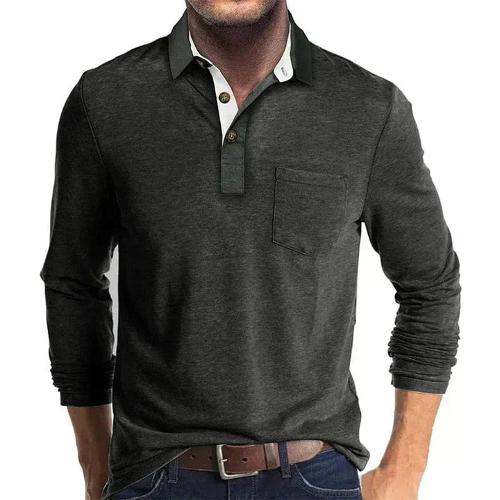 Charcoal grey long-sleeve polo shirt with a white contrast collar, two-button placket, and a chest pocket.