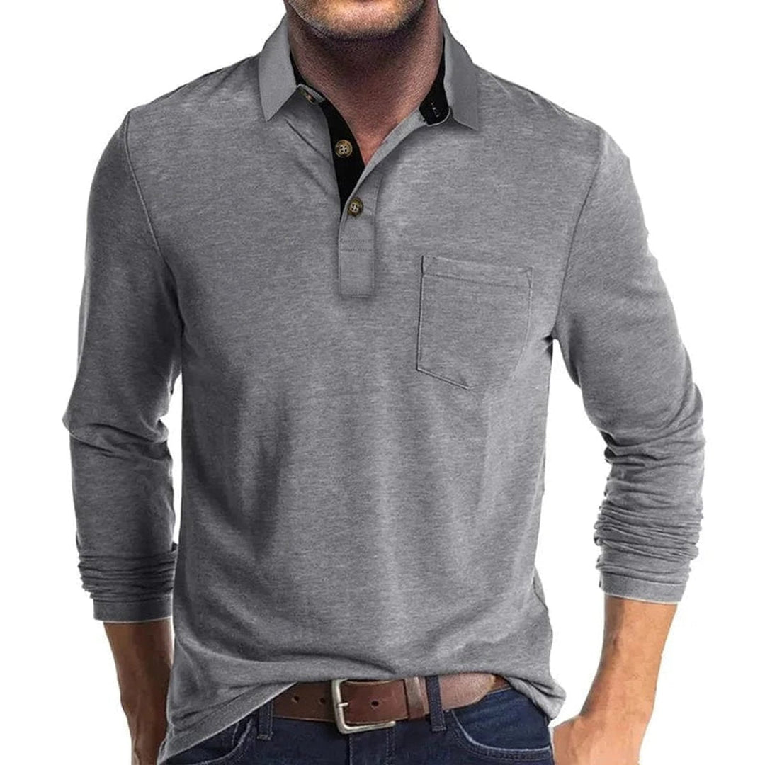 Grey long-sleeve polo shirt featuring a black contrast collar, two-button placket, and a functional chest pocket.