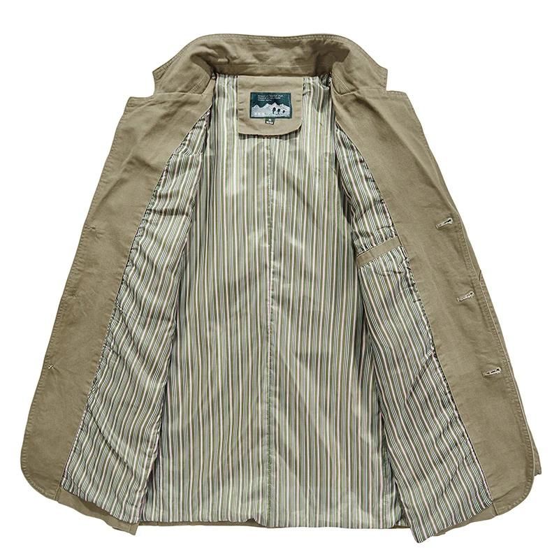 Tan cotton casual blazer with a three-button front, notch lapel, and green striped interior lining.