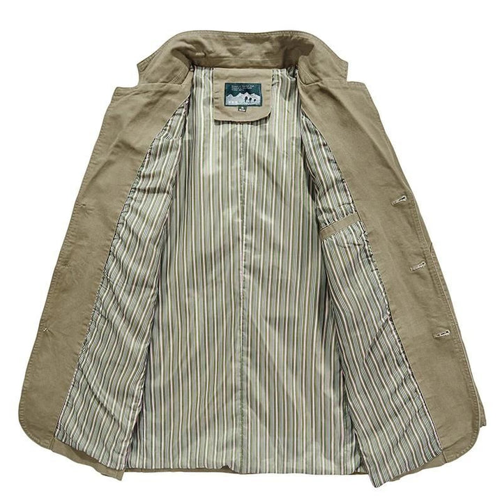 Tan cotton casual blazer with a three-button front, notch lapel, and green striped interior lining.