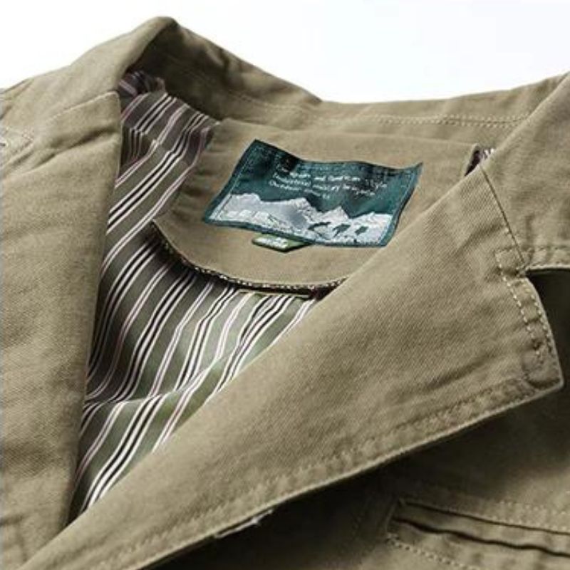 Olive green cotton casual blazer with a notch lapel and striped inner lining.