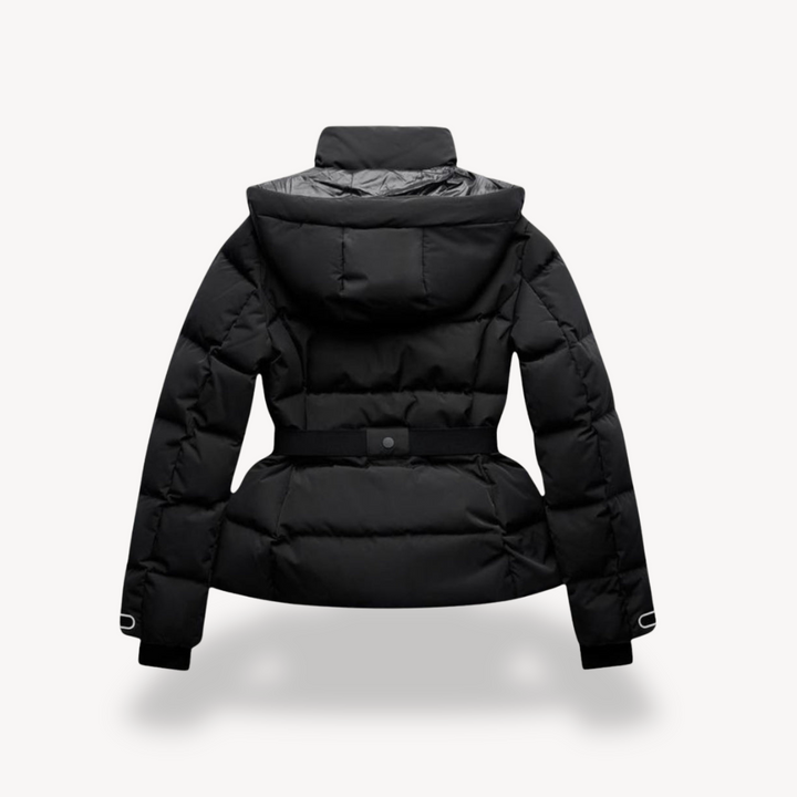 Back view of a black quilted puffer jacket with a hooded funnel neck and a cinched belted waist.