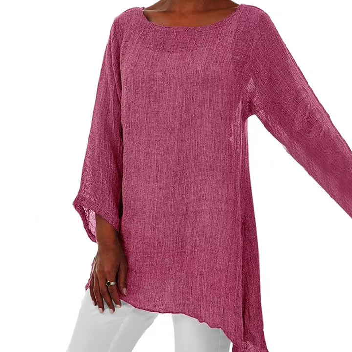 Magenta oversized linen tunic with long sleeves, a round neckline, and a relaxed, breezy longline silhouette.