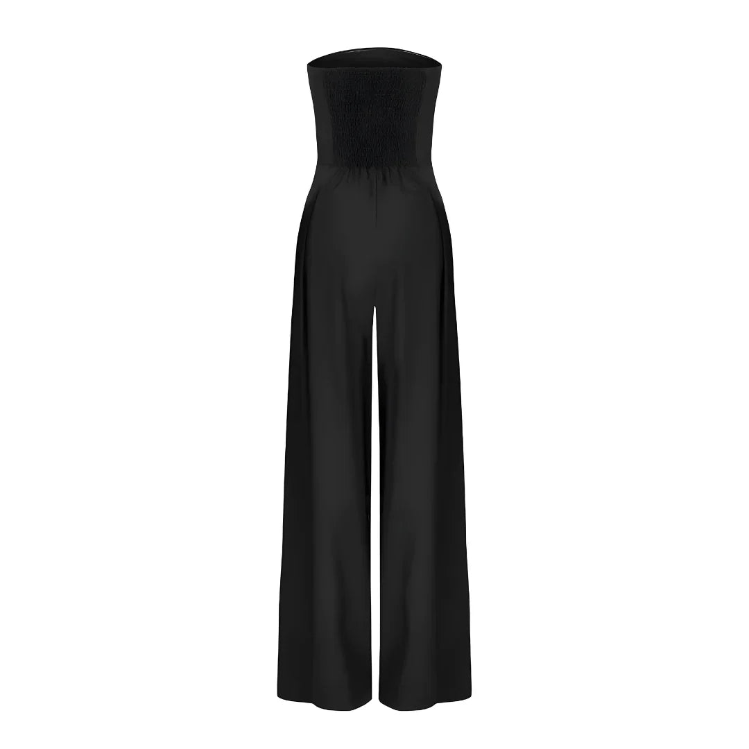 Black Imogen women's strapless wide leg jumpsuit with a shirred bodice and pleated front detail.