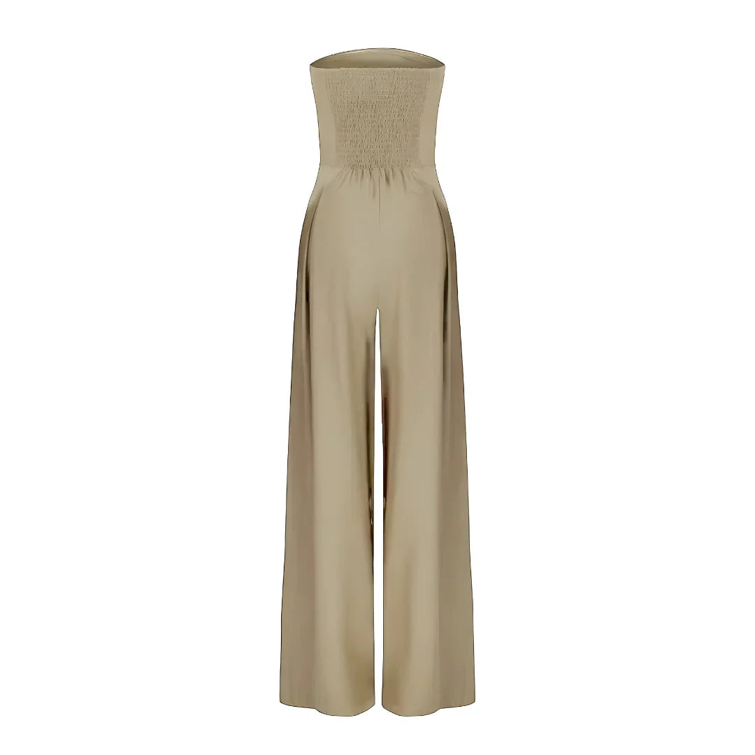 Imogen women's strapless wide-leg jumpsuit in a refined beige, featuring a shirred bodice and pleated front.