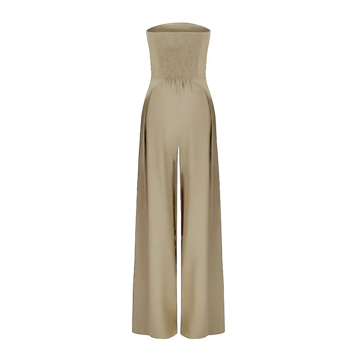 Imogen women's strapless wide-leg jumpsuit in a refined beige, featuring a shirred bodice and pleated front.