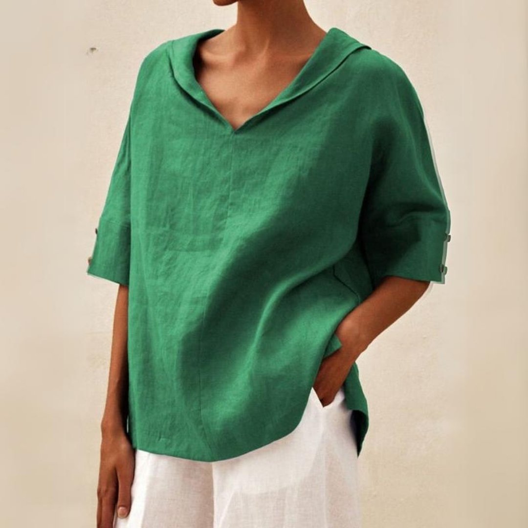 Green linen-look V-neck blouse with a draped collar, relaxed fit, and half-length sleeves featuring button cuffs.