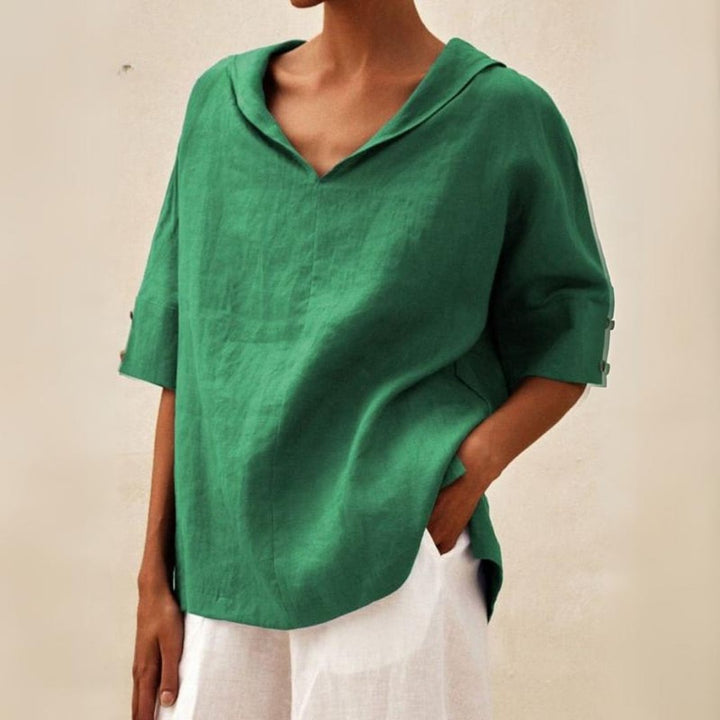 Green linen-look V-neck blouse with a draped collar, relaxed fit, and half-length sleeves featuring button cuffs.