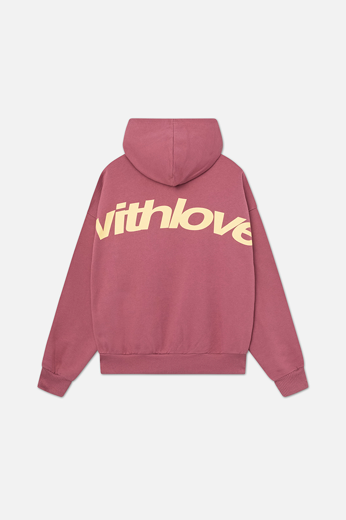 Back view of a dusty rose oversized pullover hoodie featuring a large cream-colored "withlove" graphic on the back.