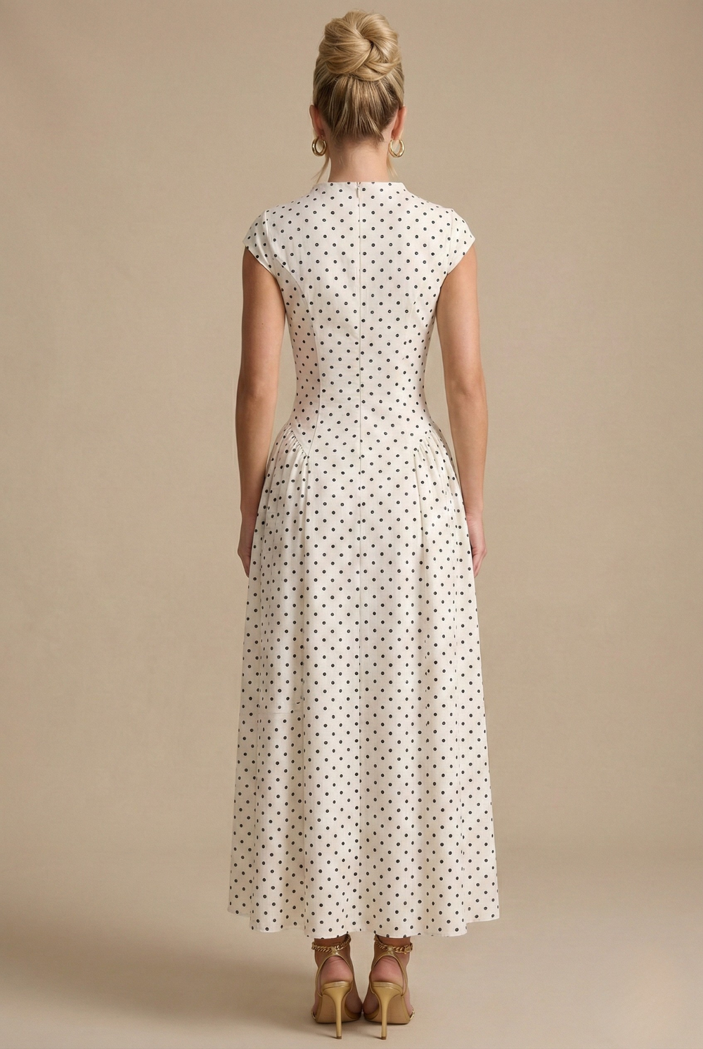 Isabelle Women's Polka Dot A-Line Maxi Dress, featuring a defined waist and elegant drape.