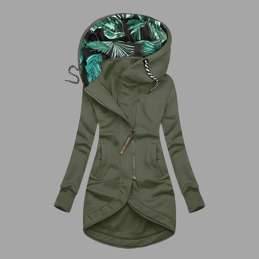 Olive green longline hooded parka with an asymmetric zip, front pockets, and a tropical leaf-print lining.