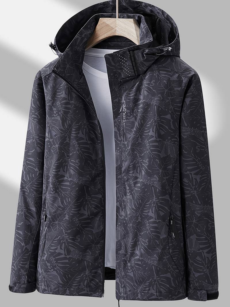 Black hooded waterproof jacket with a subtle tropical leaf print, full-length zip, and secure side pockets.