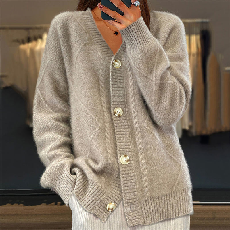 Beige wool cable knit cardigan with a V-neck, button-up front, and relaxed fit for women.