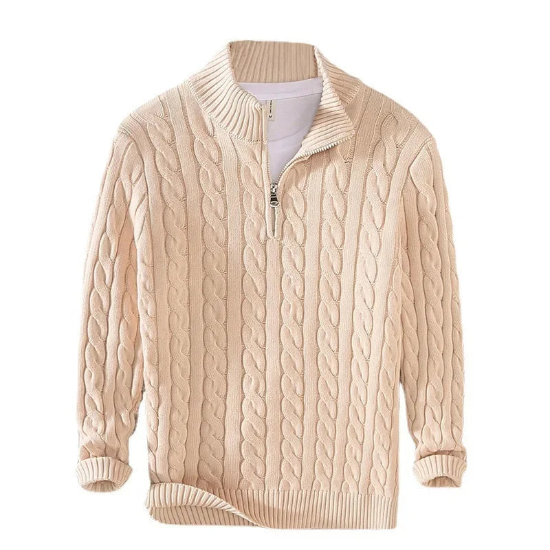 Beige cable-knit men's jumper featuring a ribbed funnel collar, half-zip neckline, and long sleeves with ribbed cuffs.