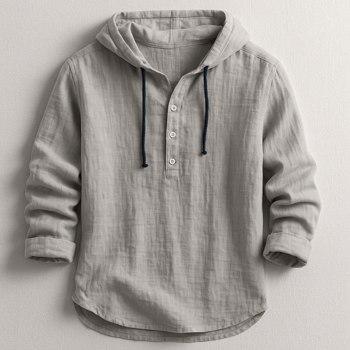 Light grey men's linen-look hooded henley shirt with a half-button placket, drawstring hood, and roll-back sleeves.