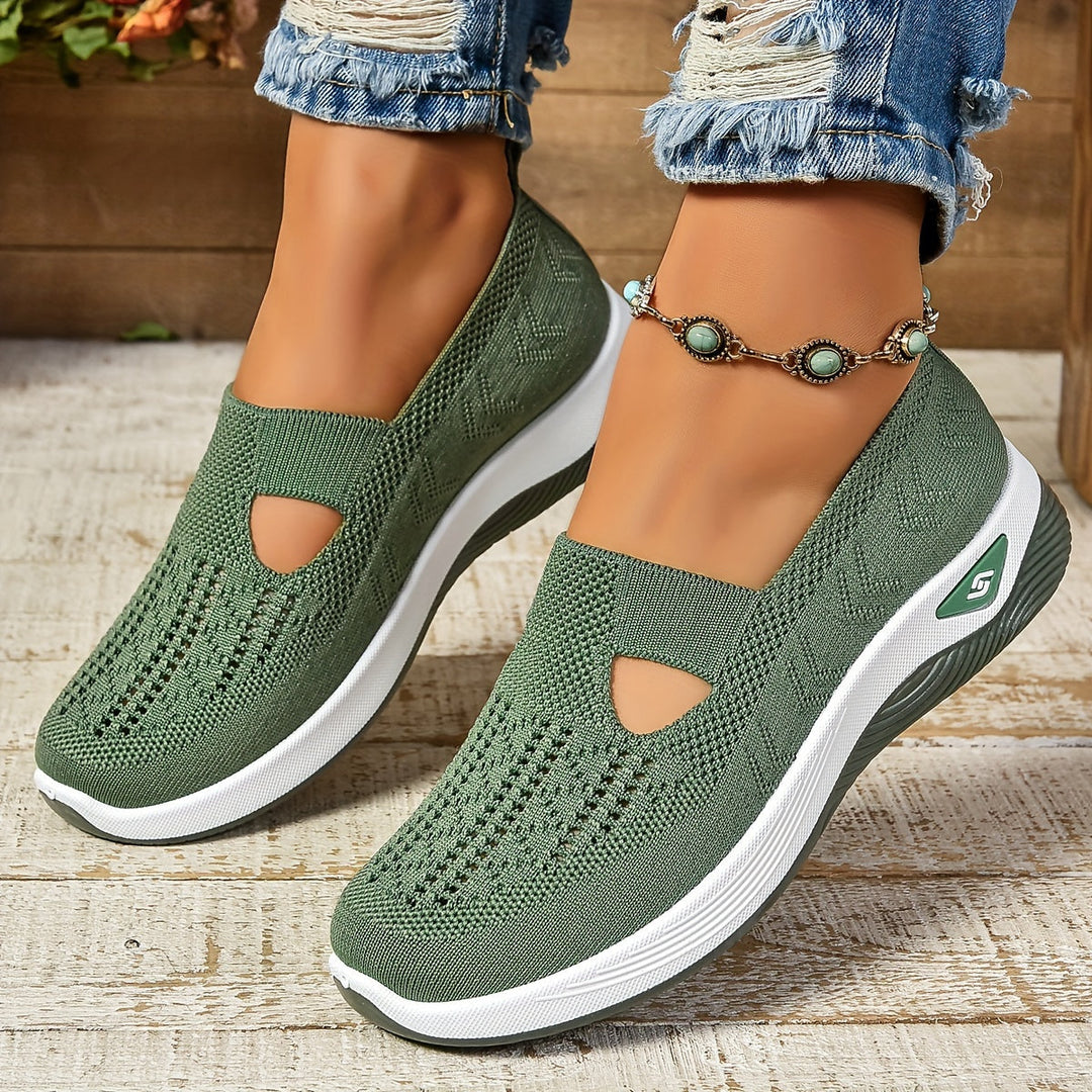 Olive green Lottie knit slip-on trainers featuring a breathable mesh upper and a supportive white cushioned platform sole.