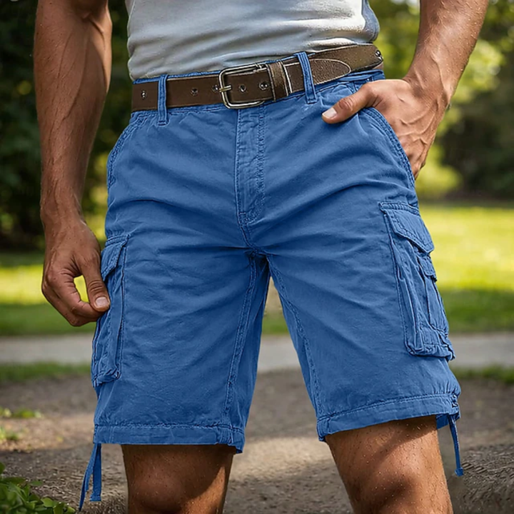 Blue knee-length cargo shorts with side pockets and a brown leather belt worn outdoors.