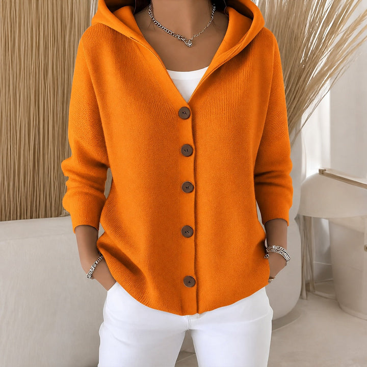 Bright orange knitted hooded cardigan with a relaxed fit and wooden-effect button-up front.